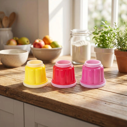3 moule silicone flan jaune rouge rose su plan travail