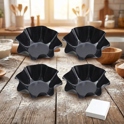 4 moules a tartelette sur table bois dans cuisine