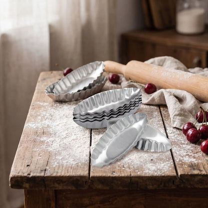 lot de 10 moule mini tartelette sur table vieux bois